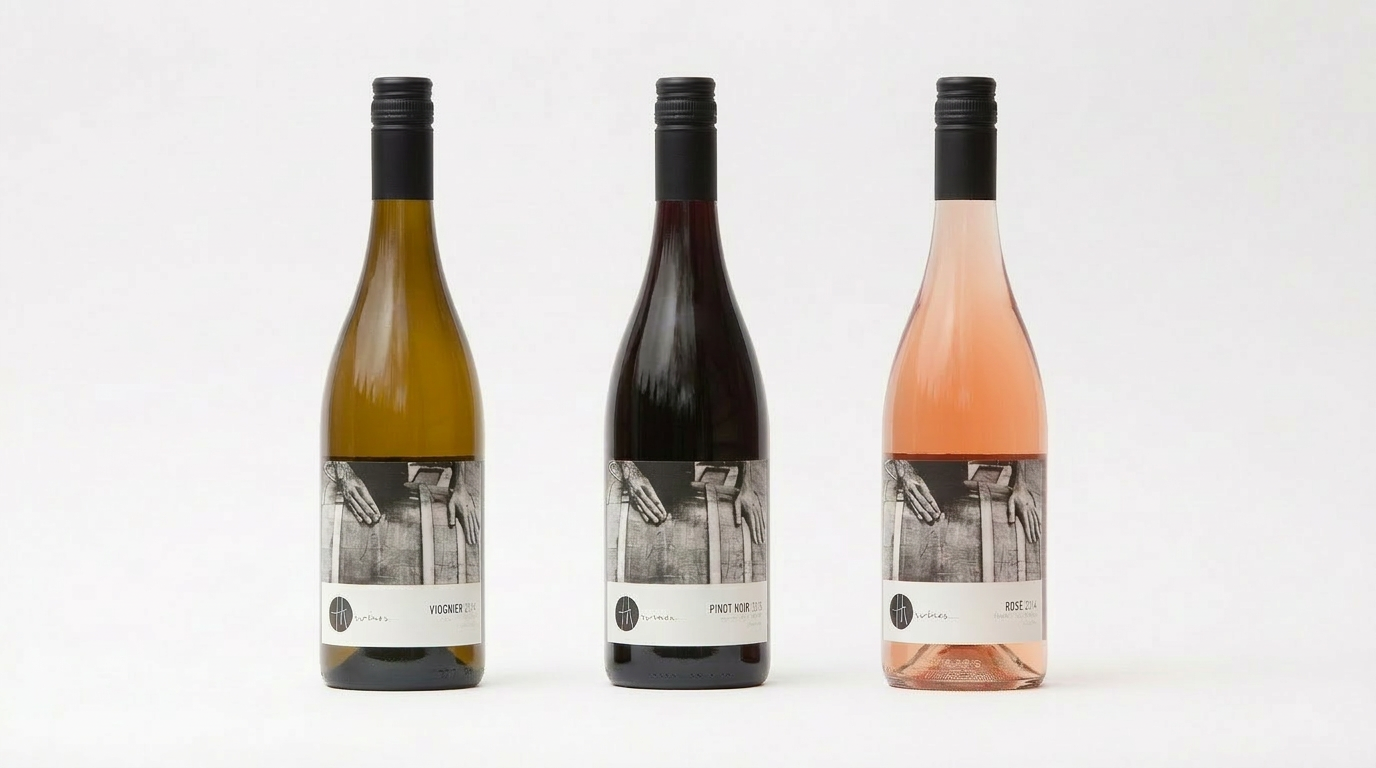 Wine bottle with a label on a white background TH Wines Winery Branding Wine Label and Brand Identity